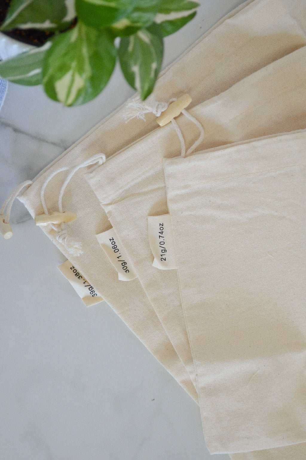 Muslin Drawstring Bag + Microfiber Cloth — Sourced Co.